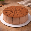 Chocolate mousse with a dusting of cocoa powder on a wooden surface